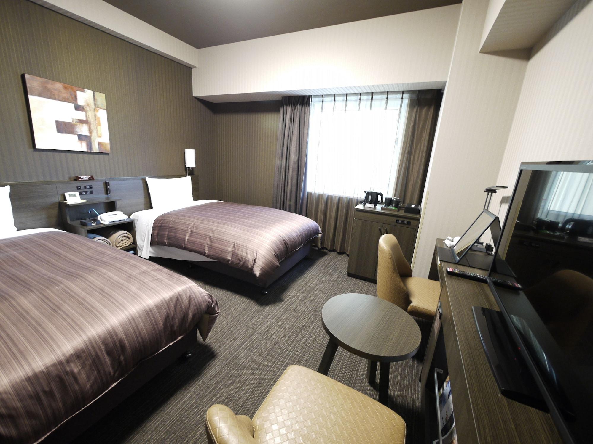 Hotel Route-Inn Chitose Ekimae Екстер'єр фото