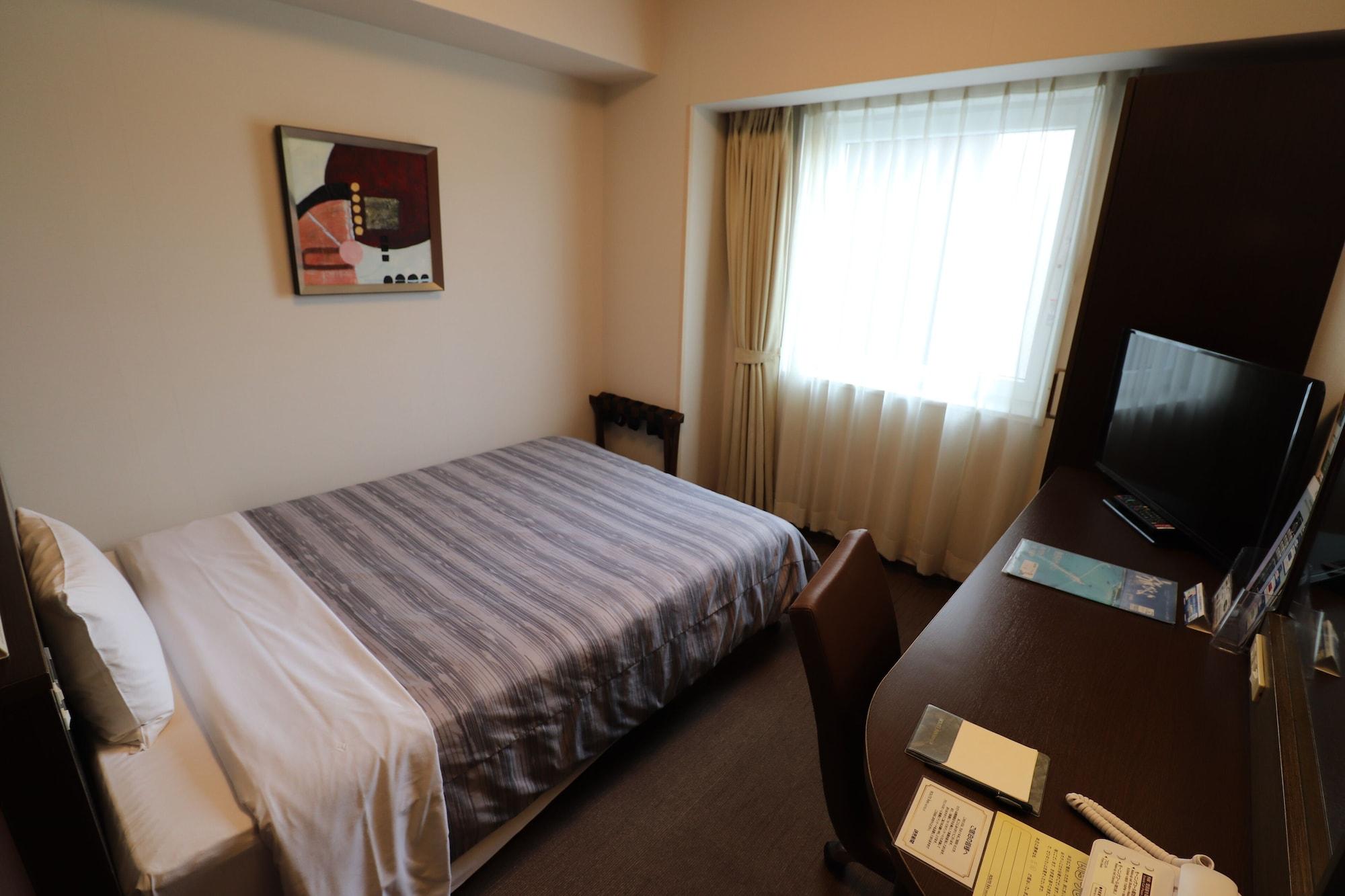 Hotel Route-Inn Chitose Ekimae Екстер'єр фото