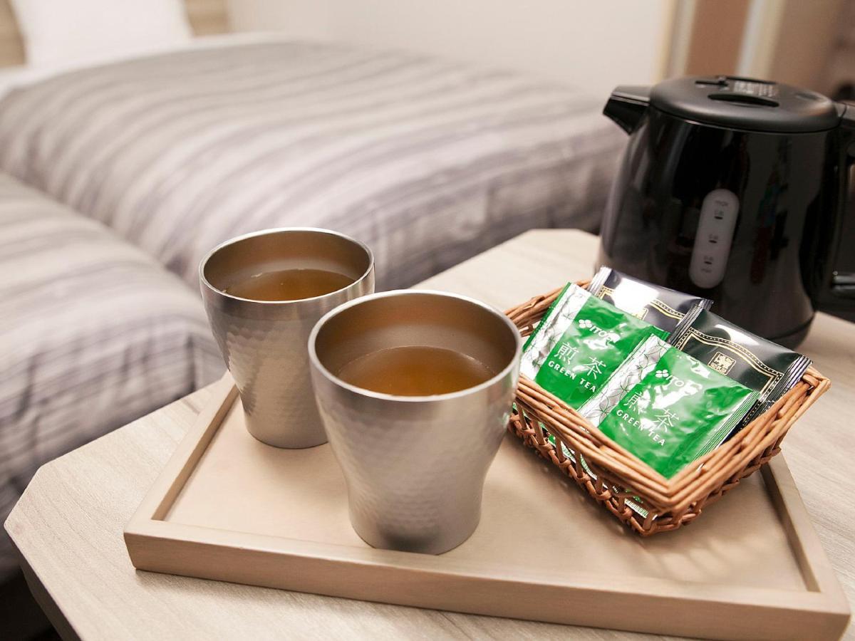 Hotel Route-Inn Chitose Ekimae Екстер'єр фото