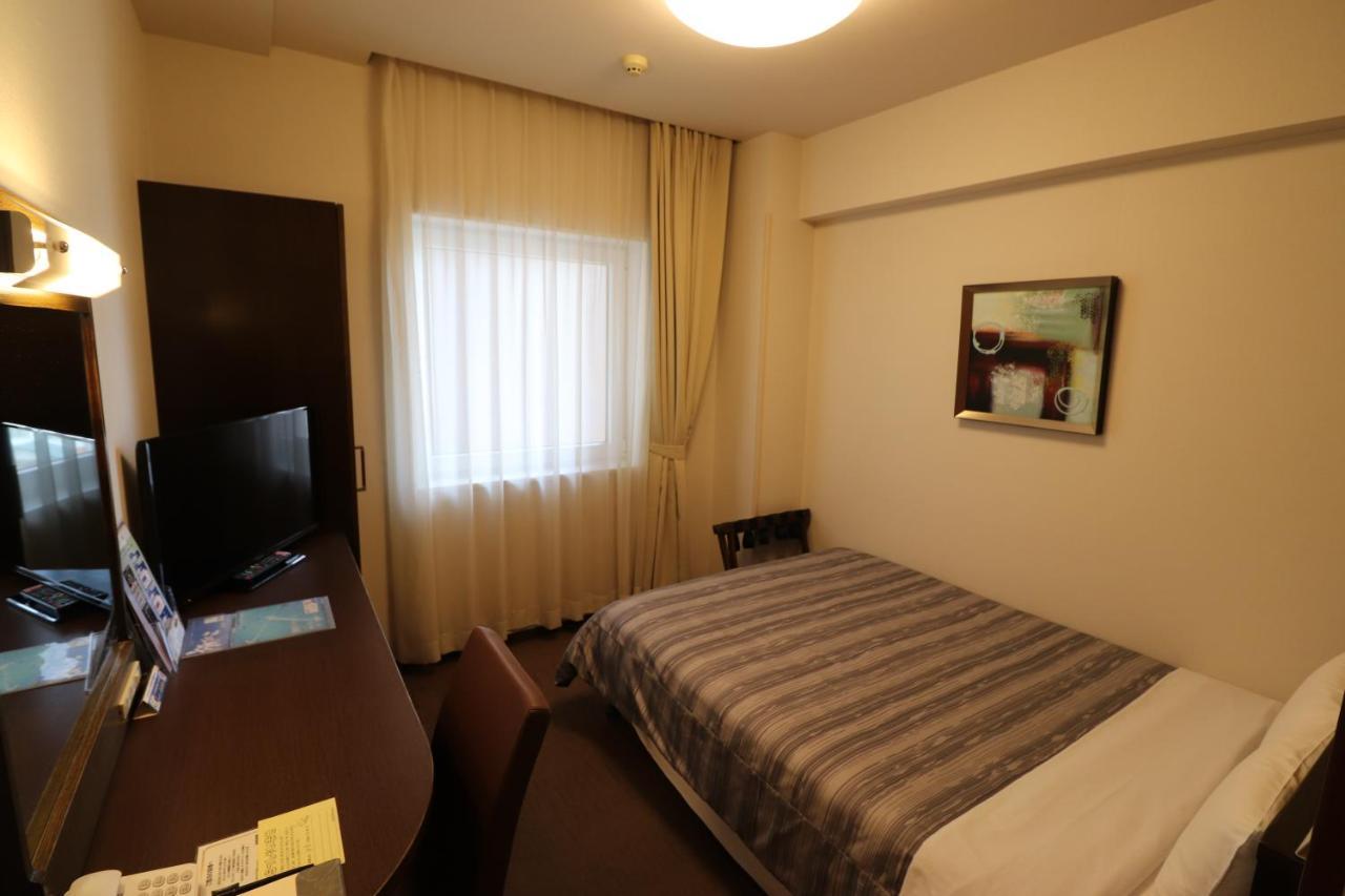 Hotel Route-Inn Chitose Ekimae Екстер'єр фото
