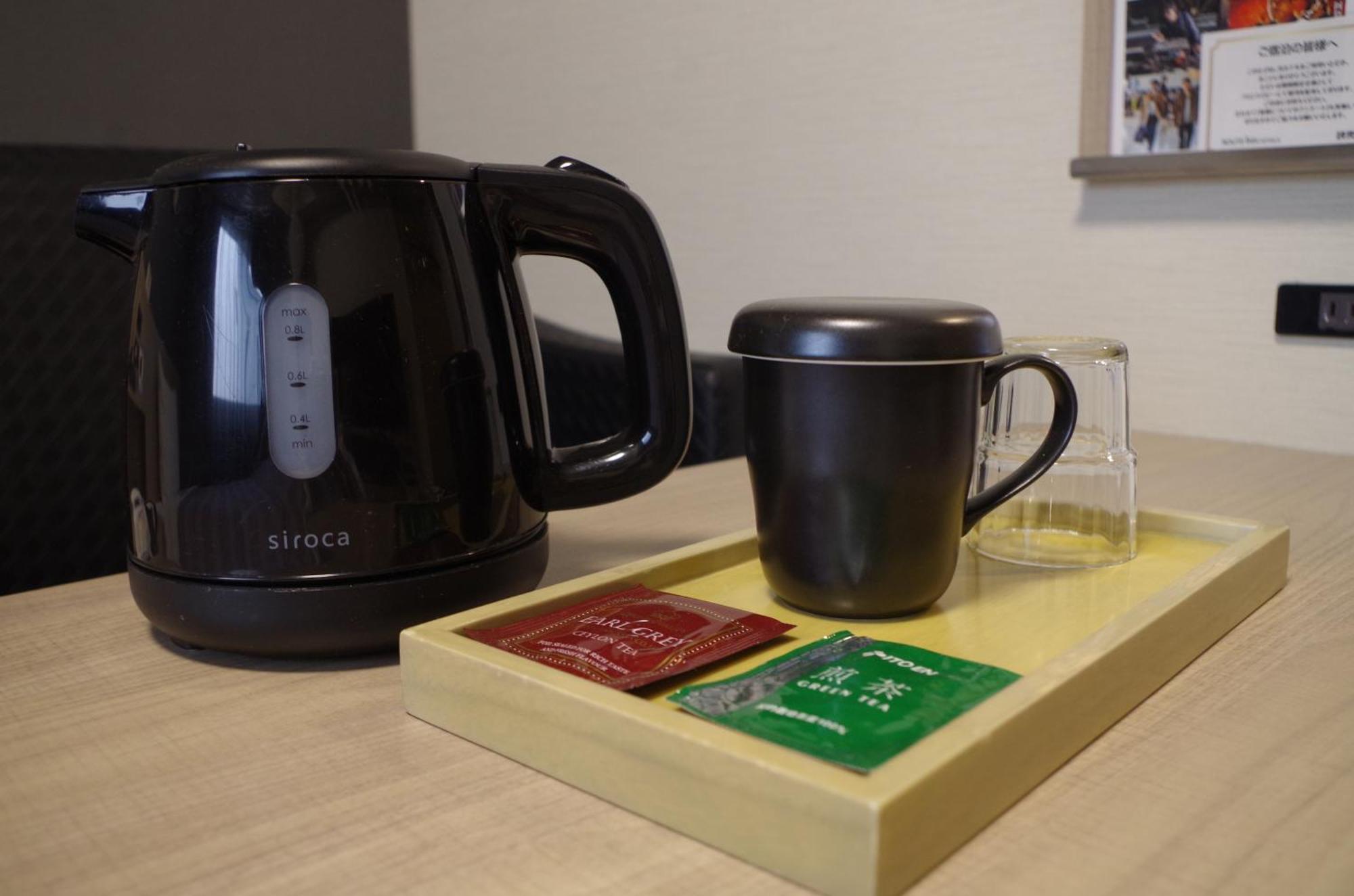 Hotel Route-Inn Chitose Ekimae Екстер'єр фото