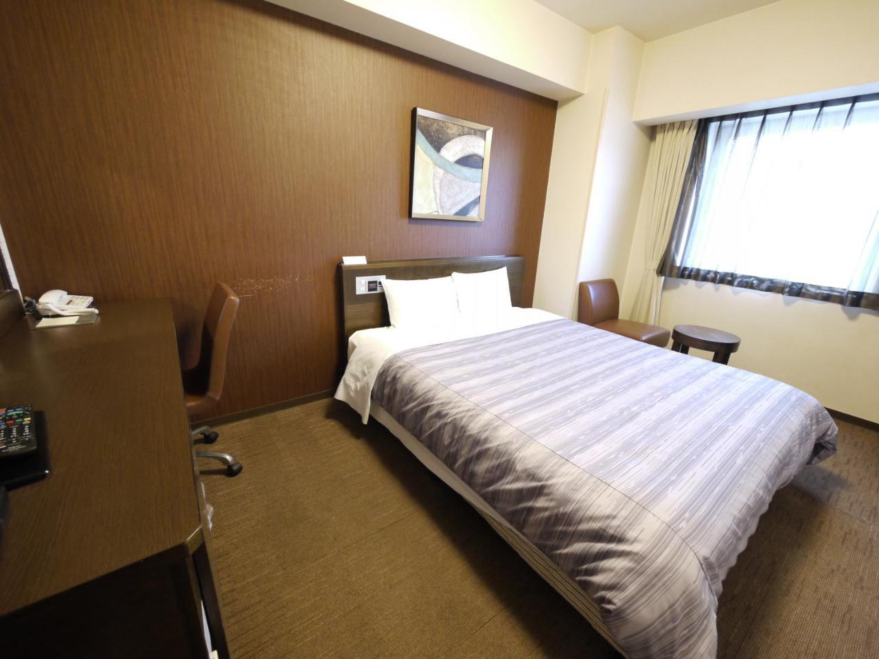 Hotel Route-Inn Chitose Ekimae Екстер'єр фото