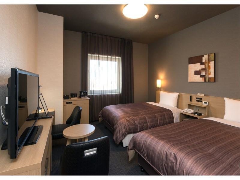 Hotel Route-Inn Chitose Ekimae Екстер'єр фото